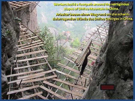 Workers build a footpath around the vertiginous slopes of Shifou Mountain in China. Arbeiter bauen einen Weg rund um die schwin-delerregenden Wände des.