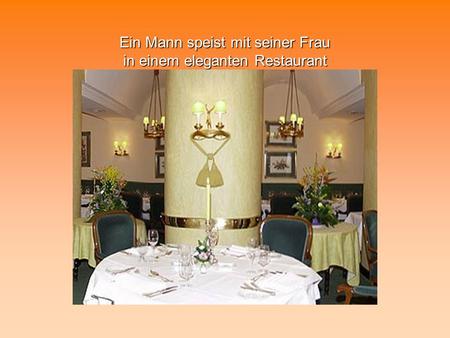 Ein Mann speist mit seiner Frau in einem eleganten Restaurant.