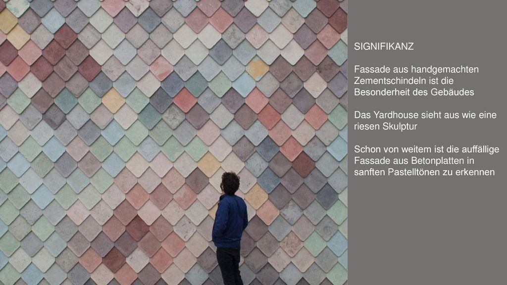 SIGNIFIKANZ Fassade aus handgemachten Zementschindeln ist die Besonderheit des Gebäudes. Das Yardhouse sieht aus wie eine riesen Skulptur.