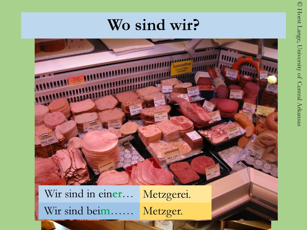 Wo sind wir Wir sind in einer… Metzgerei. Wir sind beim…… Metzger.