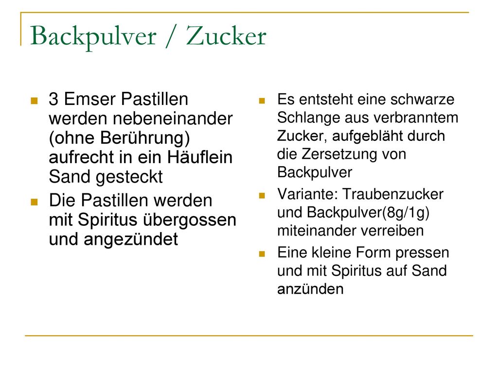 Backpulver / Zucker 3 Emser Pastillen werden nebeneinander (ohne Berührung) aufrecht in ein Häuflein Sand gesteckt.