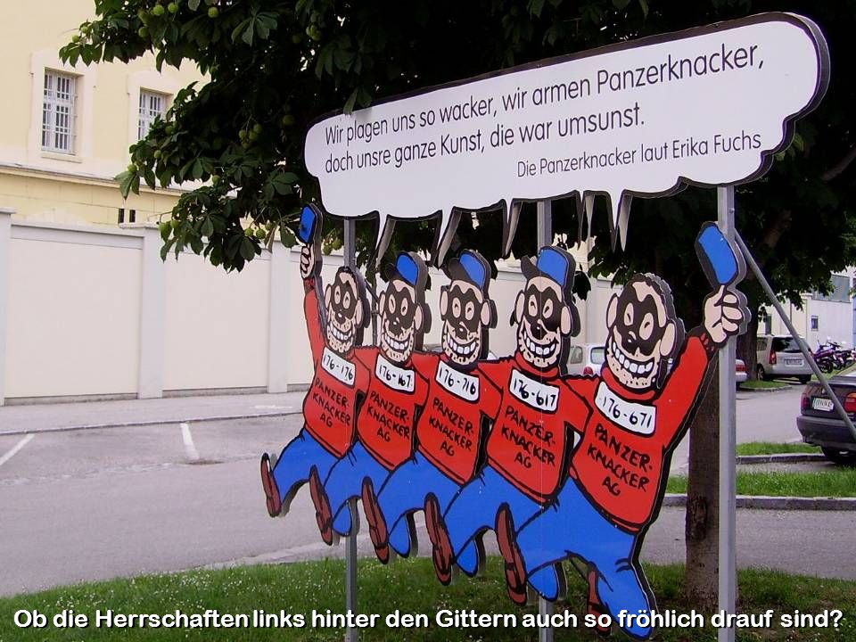 Ob die Herrschaften links hinter den Gittern auch so fröhlich drauf sind