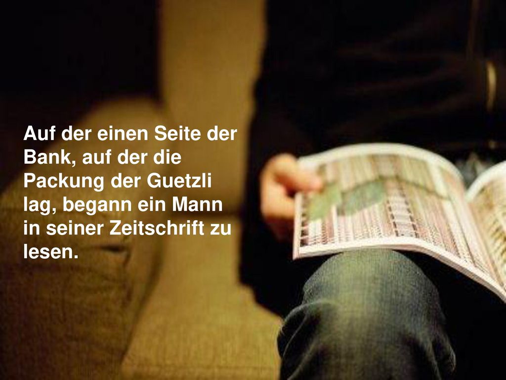 Auf der einen Seite der Bank, auf der die Packung der Guetzli lag, begann ein Mann in seiner Zeitschrift zu lesen.