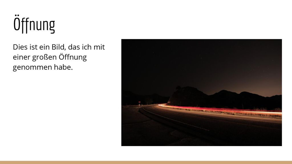 Öffnung Dies ist ein Bild, das ich mit einer großen Öffnung genommen habe. Der Lichtstreifen in diesem Bild ist eigentlich ein Auto.
