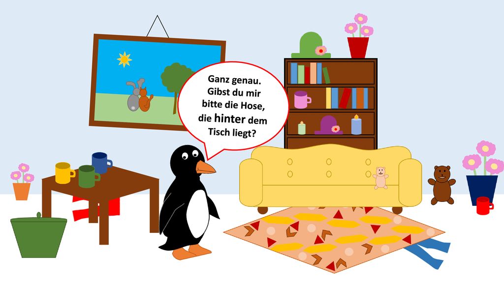Ganz genau. Gibst du mir bitte die Hose, die hinter dem Tisch liegt