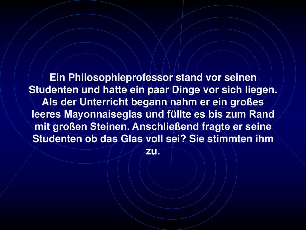 Ein Philosophieprofessor stand vor seinen Studenten und hatte ein paar Dinge vor sich liegen.