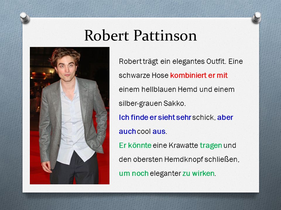Robert Pattinson Robert trägt ein elegantes Outfit. Eine schwarze Hose kombiniert er mit einem hellblauen Hemd und einem silber-grauen Sakko.